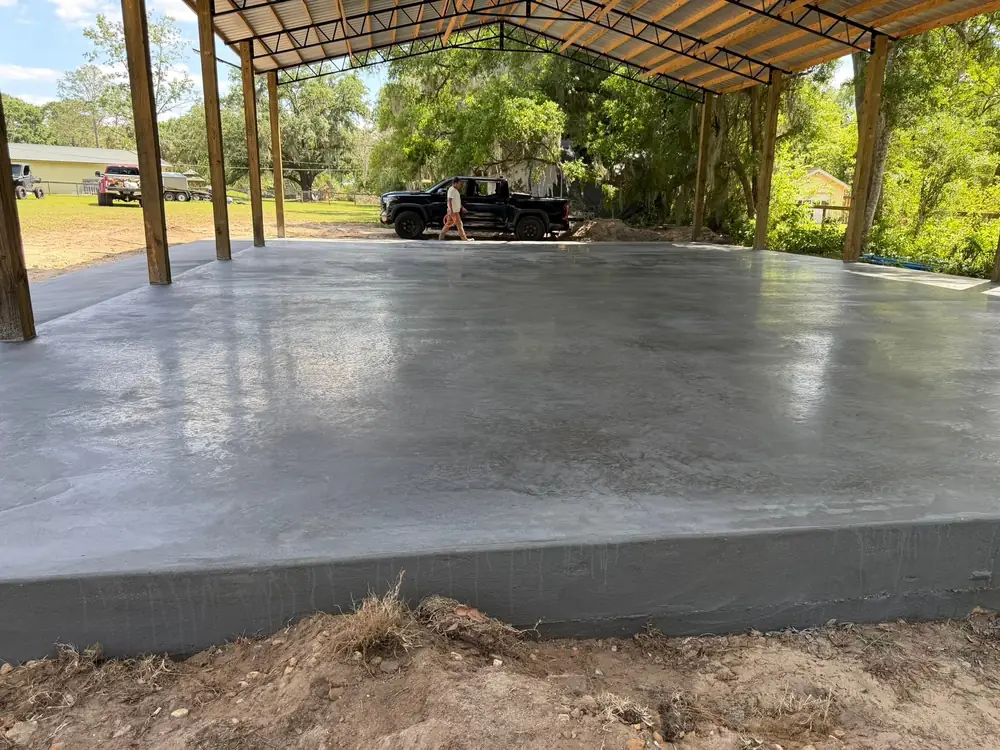 Freshly finished concrete slab, surface still green