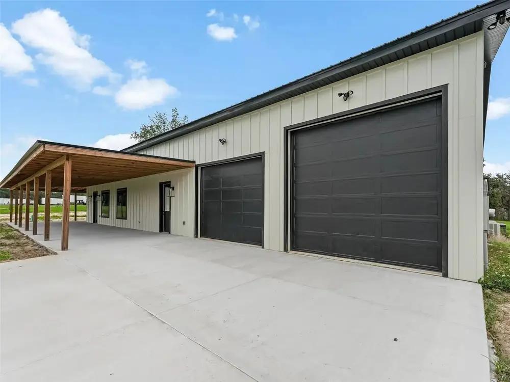 Concrete apron poured in front of a row of garage doors