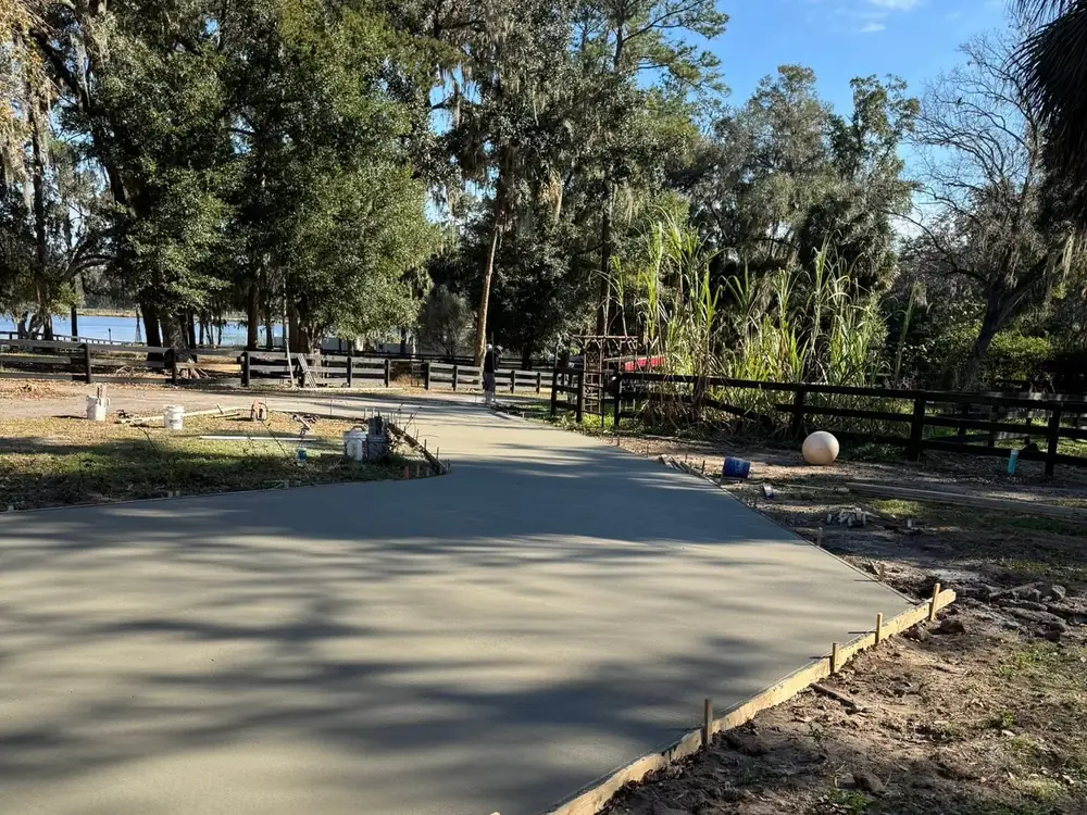 Poured concrete slab with the forms still set around it